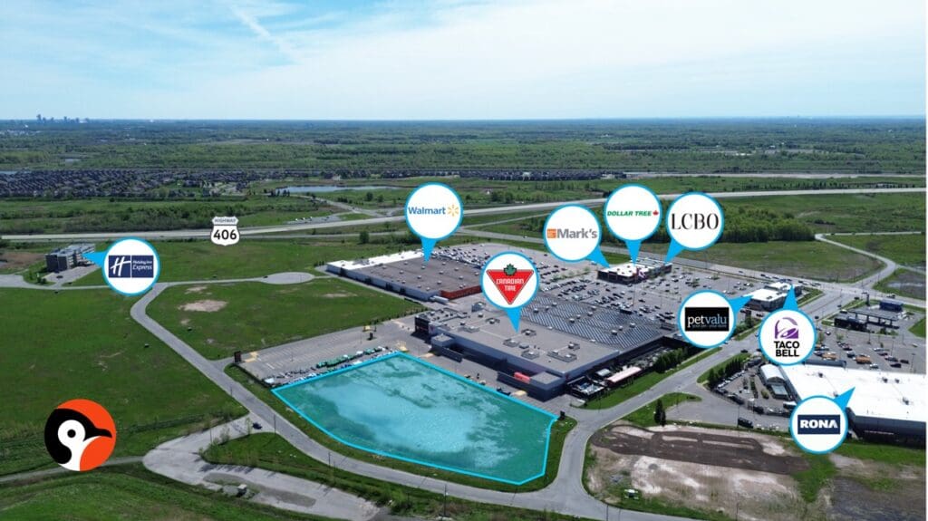 Aerial view of shopping plaza with store markers